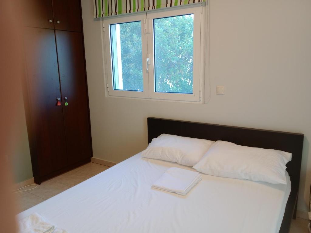 Postel nebo postele na pokoji v ubytování Green House Marathon - Greece