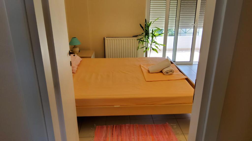 Postel nebo postele na pokoji v ubytování orange