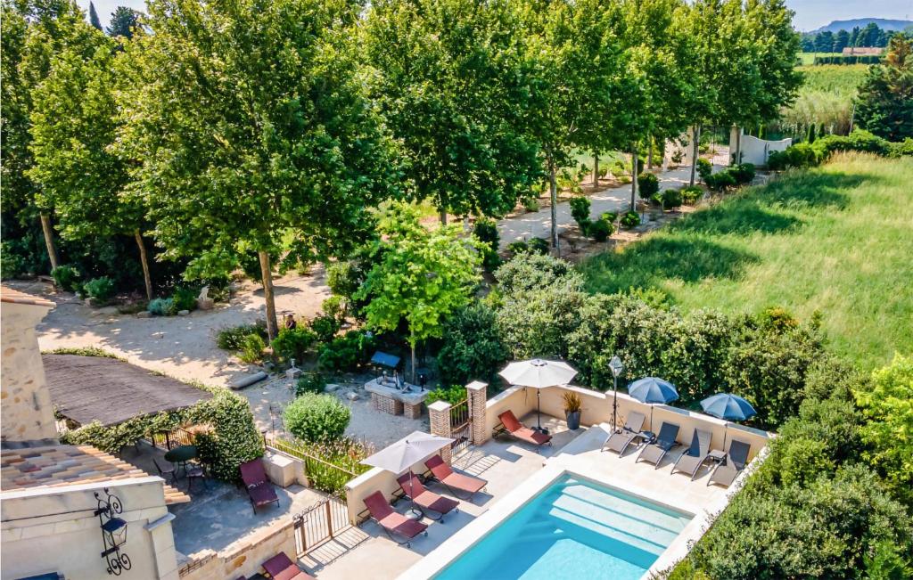 an aerial view of a villa with a swimming pool at Lovely Home In Vallabregues in Vallabrègues