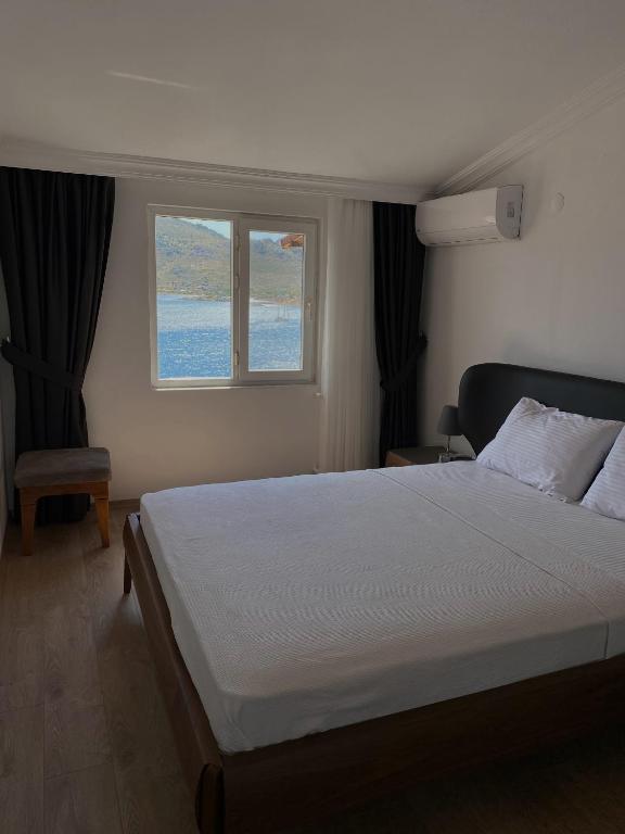 Postel nebo postele na pokoji v ubytování Melisa Hotel