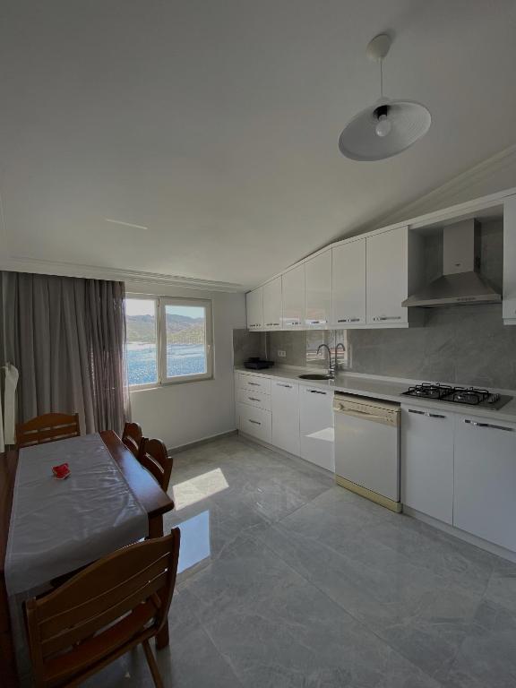 Kuchyň nebo kuchyňský kout v ubytování Melisa Hotel