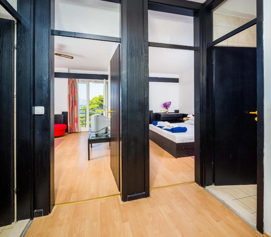 Ліжко або ліжка в номері Hotel Hvar