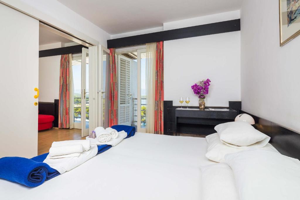 Ліжко або ліжка в номері Hotel Hvar