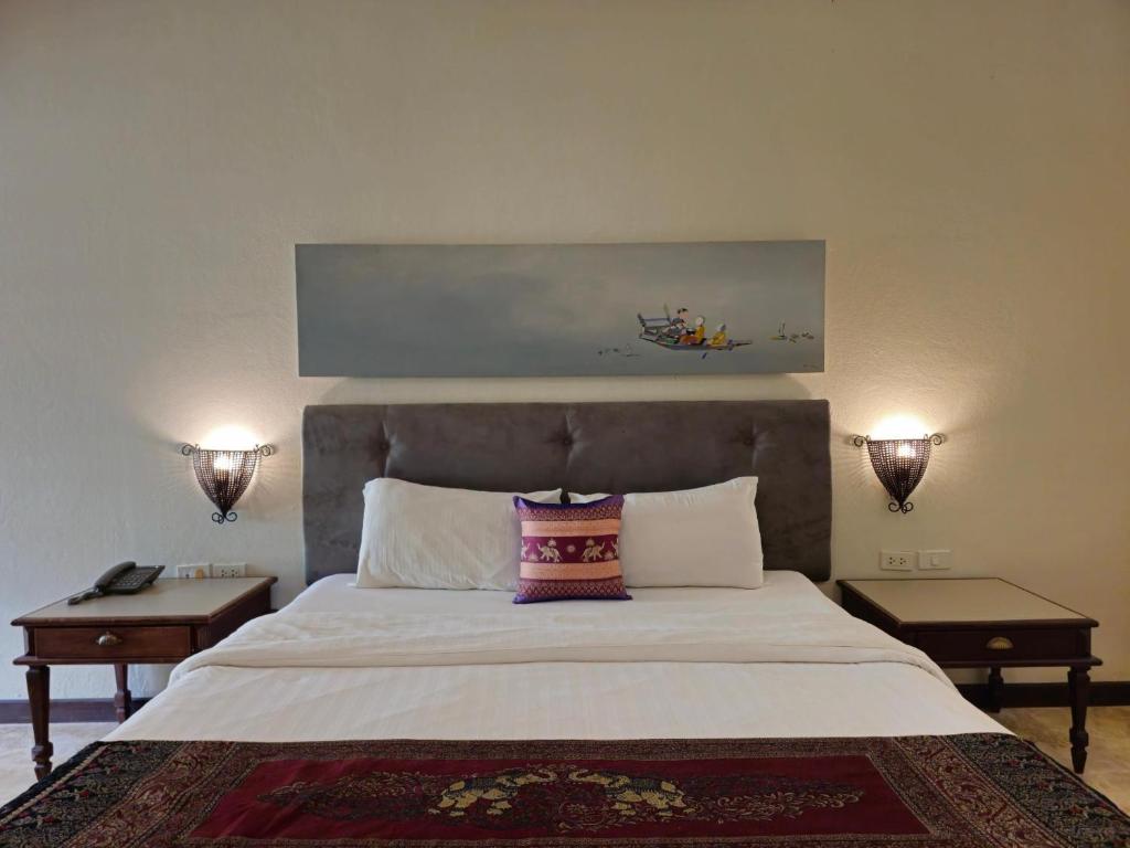 Postel nebo postele na pokoji v ubytování Baan Panwa Resort