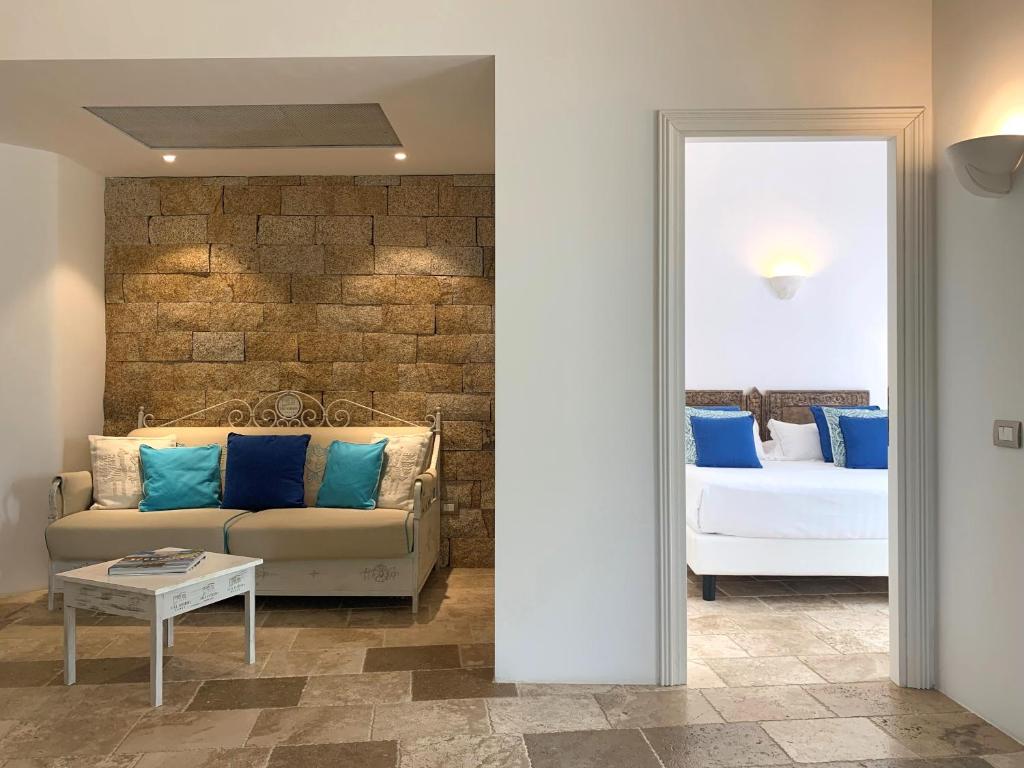 Posteľ alebo postele v izbe v ubytovaní Hotel Cala Caterina