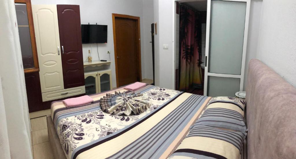 Postel nebo postele na pokoji v ubytování Camping & Guest House Herges