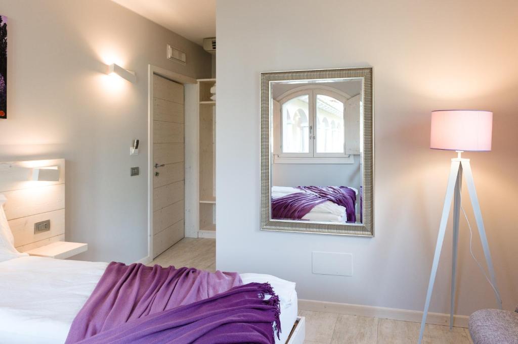 Postel nebo postele na pokoji v ubytování Bianco Hotel