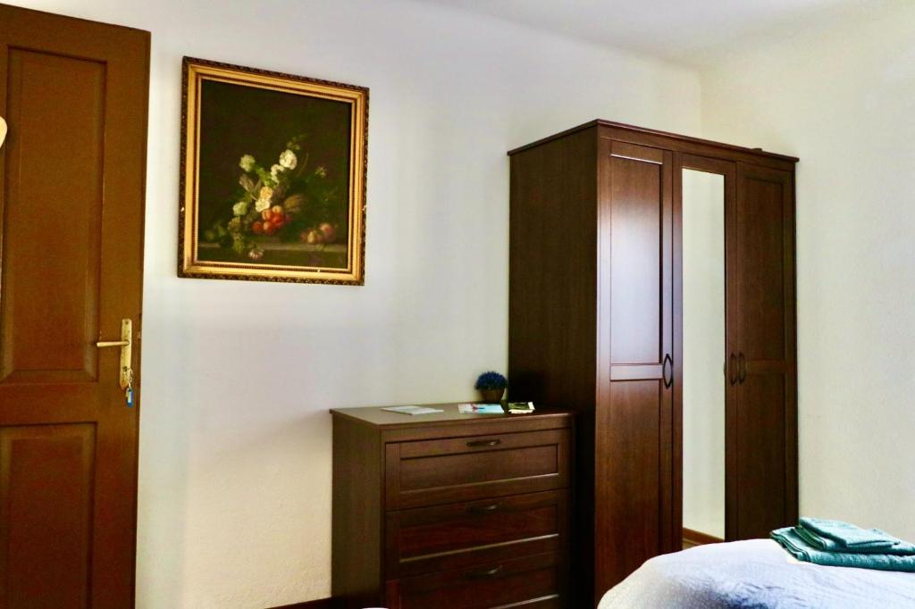 Postel nebo postele na pokoji v ubytování Casa di Carla