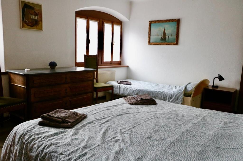 Postel nebo postele na pokoji v ubytování Casa di Carla