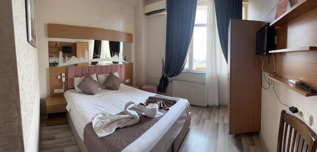 Postel nebo postele na pokoji v ubytování Divas Silver
