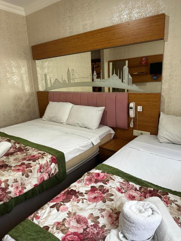Postel nebo postele na pokoji v ubytování Divas Silver