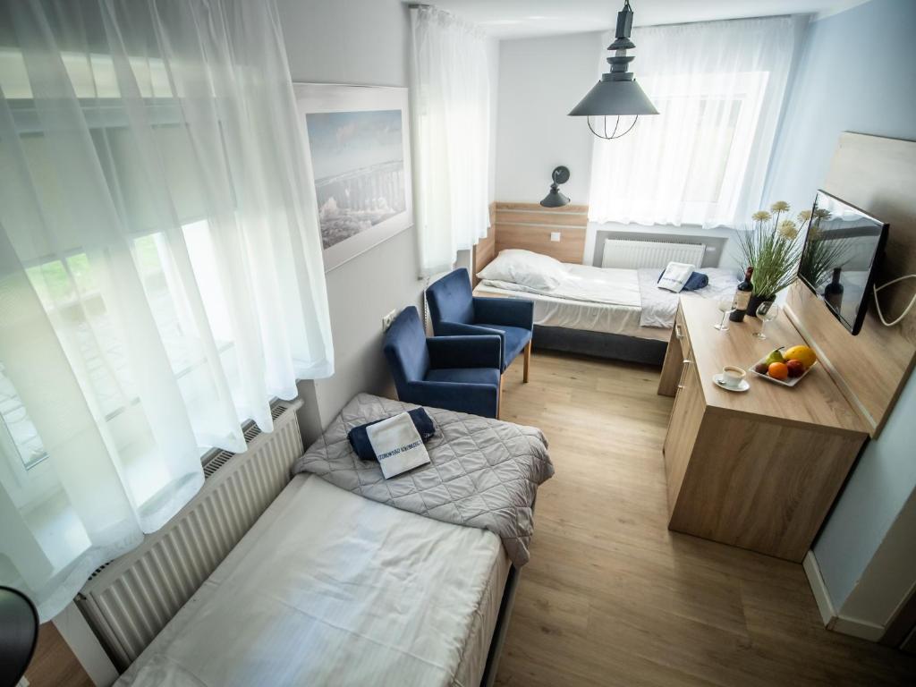 Postel nebo postele na pokoji v ubytování Sanatorium Mewa