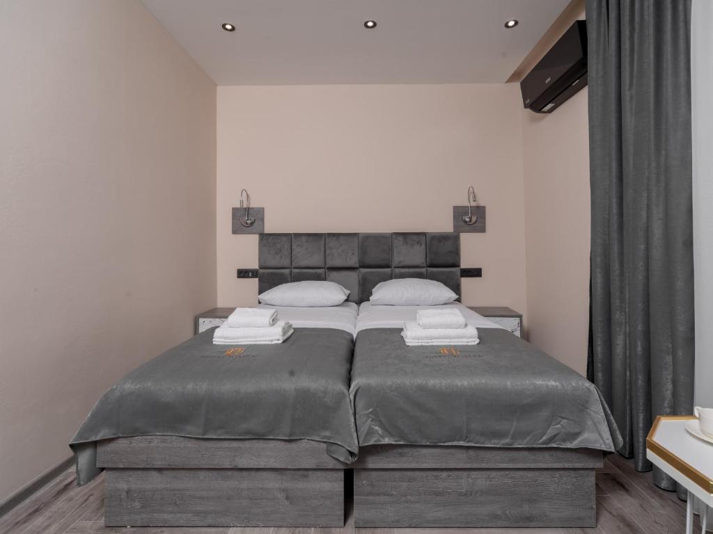 Cama o camas de una habitación en Hotel Diman