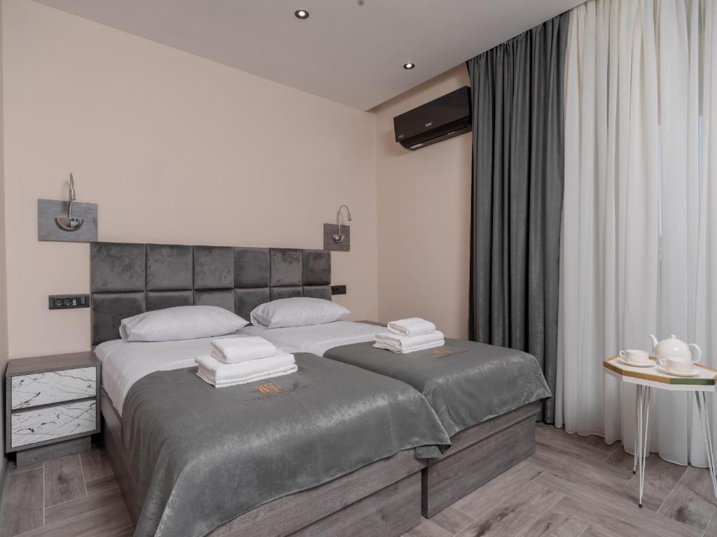 Cama o camas de una habitación en Hotel Diman