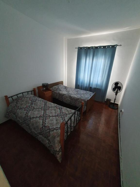 Postel nebo postele na pokoji v ubytování Indie7house