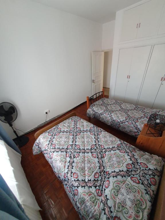 Postel nebo postele na pokoji v ubytování Indie7house