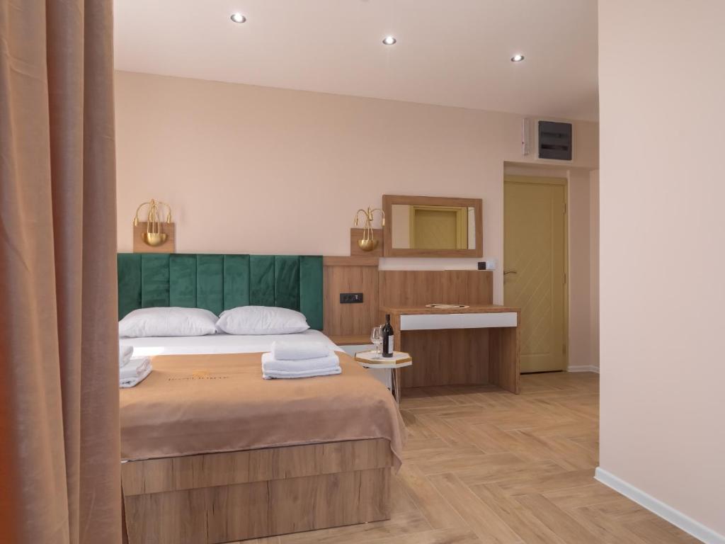 Cama o camas de una habitación en Hotel Diman