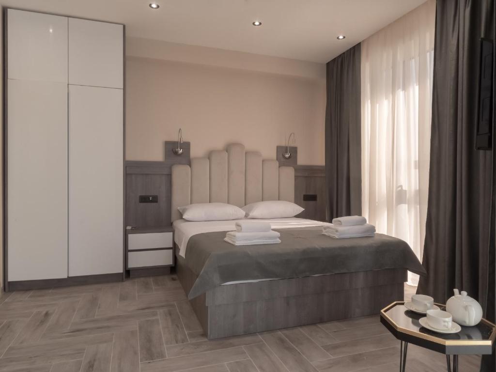 Cama o camas de una habitación en Hotel Diman