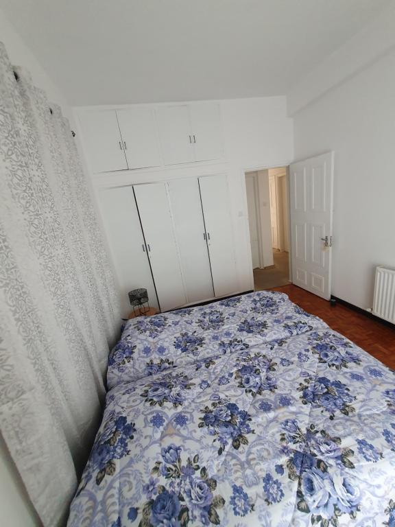 Postel nebo postele na pokoji v ubytování Indie7house