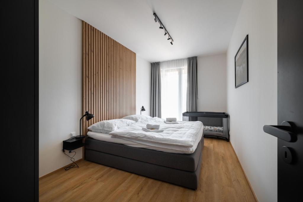 Postel nebo postele na pokoji v ubytování Apartmány Florián
