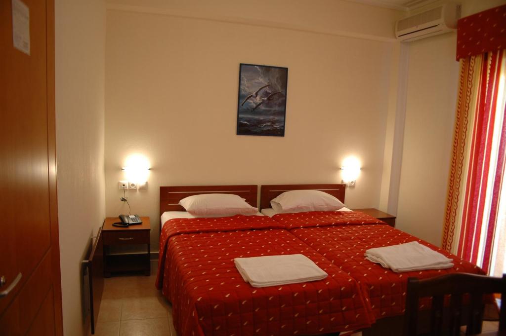 Postel nebo postele na pokoji v ubytování Hotel Souita