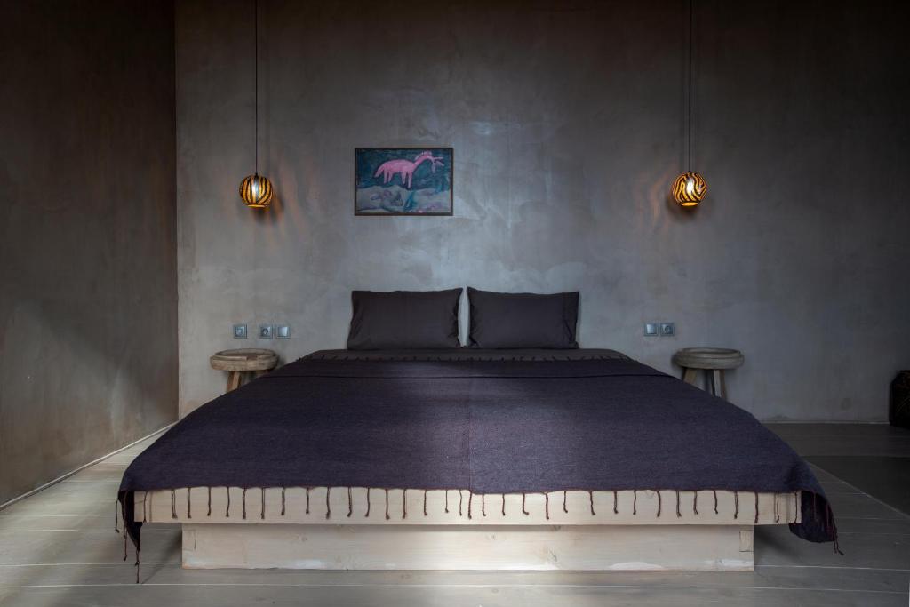 Postel nebo postele na pokoji v ubytování Life Gallery Hotel & Spa