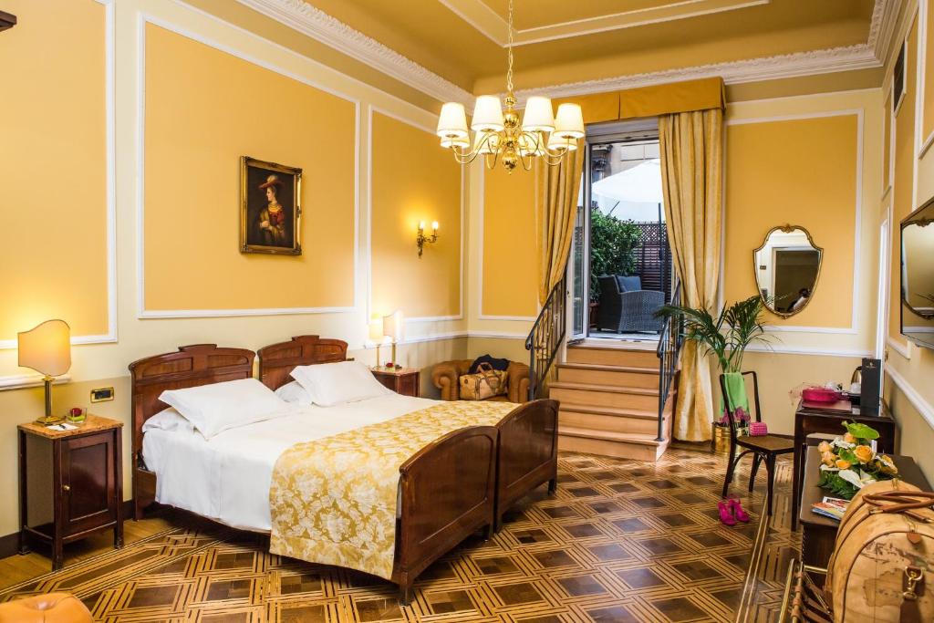 Voodi või voodid majutusasutuse Hotel Bristol Palace toas