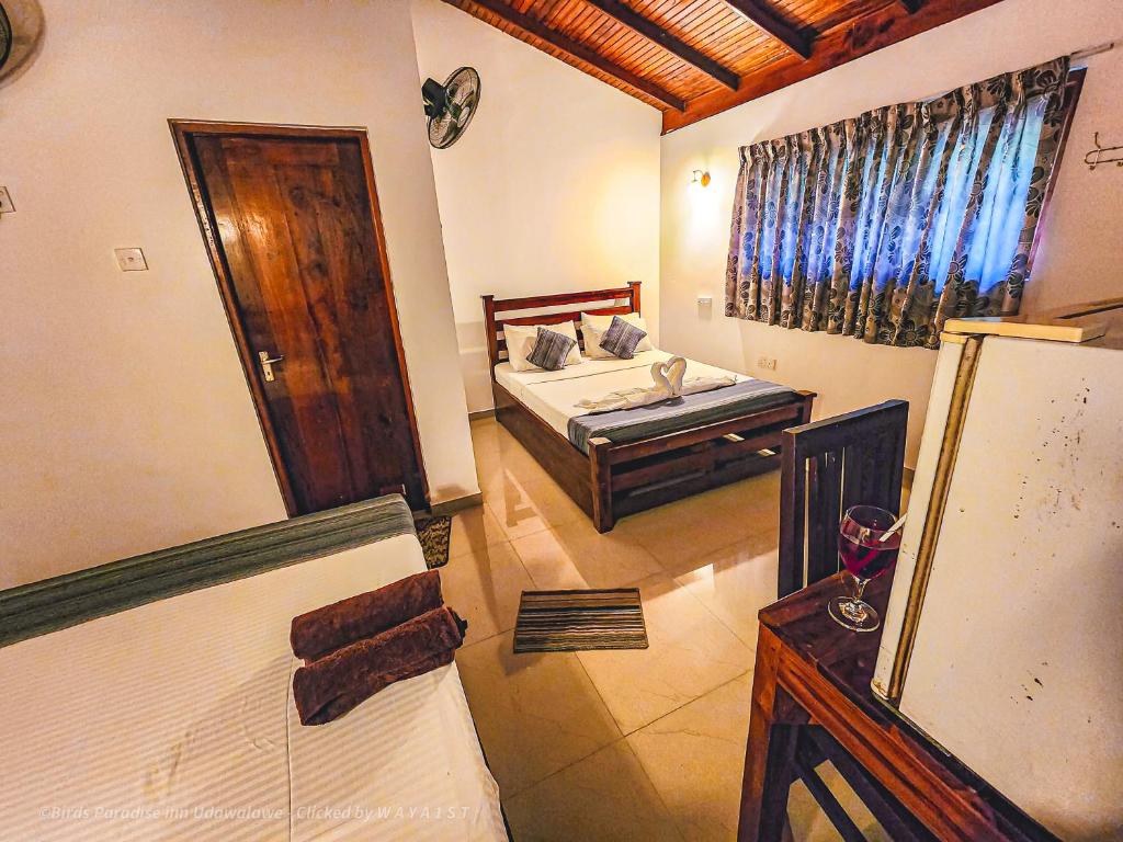 Kuchyň nebo kuchyňský kout v ubytování Birds Paradise Inn