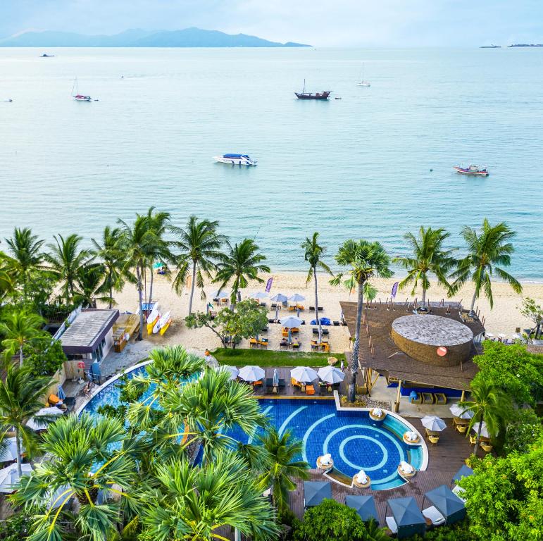 an aerial view of a resort with a pool and a beach at Bandara Resort and Spa, Samui in Bophut