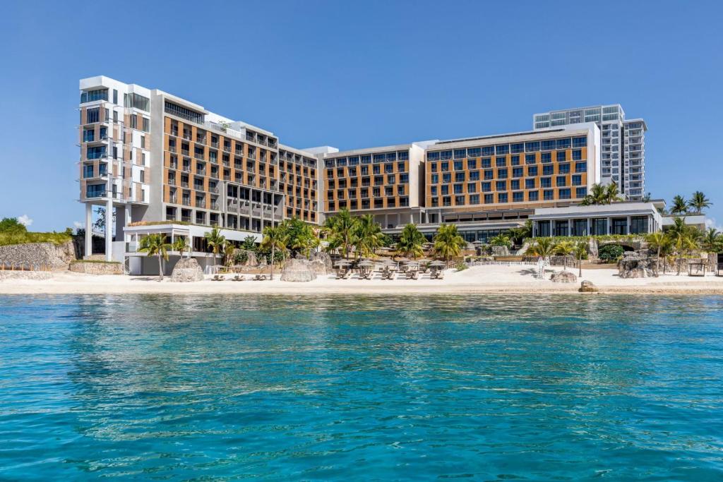 a view of a resort from the water at Sheraton Cebu Mactan Resort in Mactan