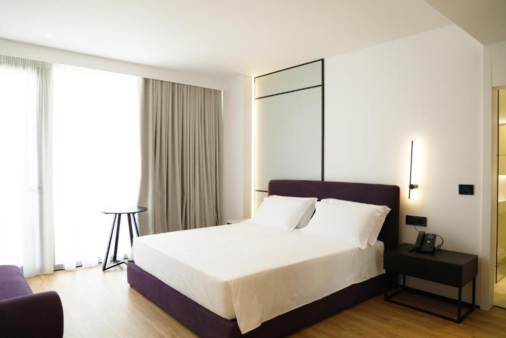 Postel nebo postele na pokoji v ubytování Mango Luxury Resorts