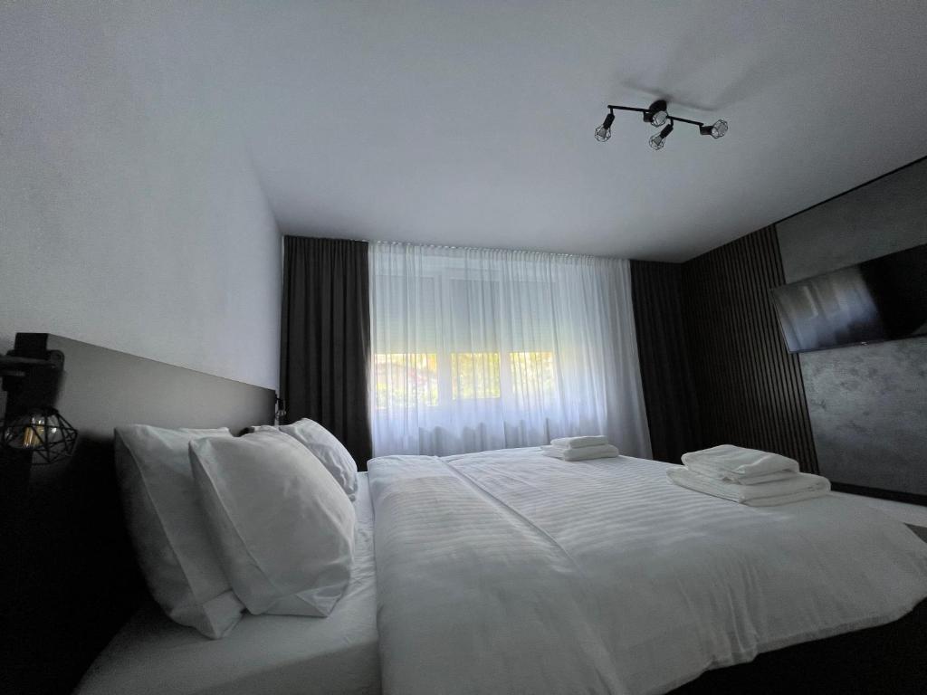 Postel nebo postele na pokoji v ubytování Onix
