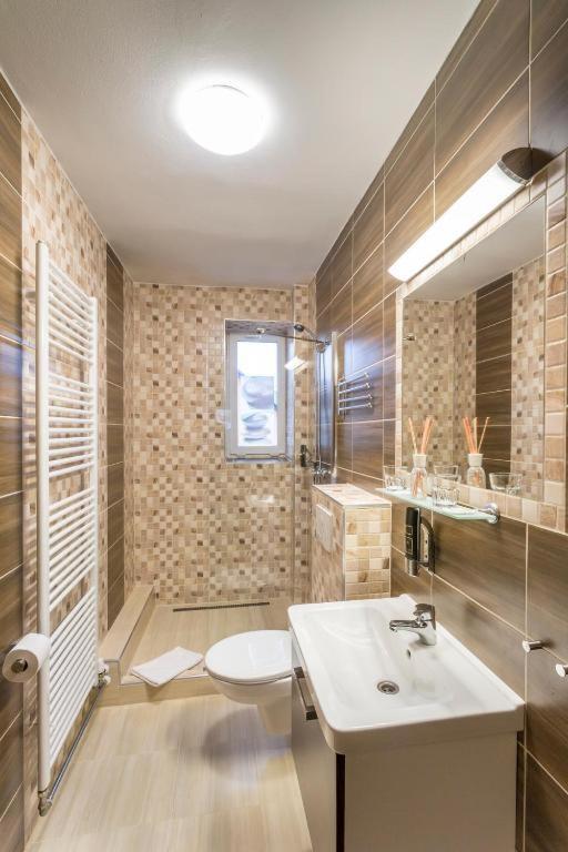 Koupelna v ubytování Hotel Sipox