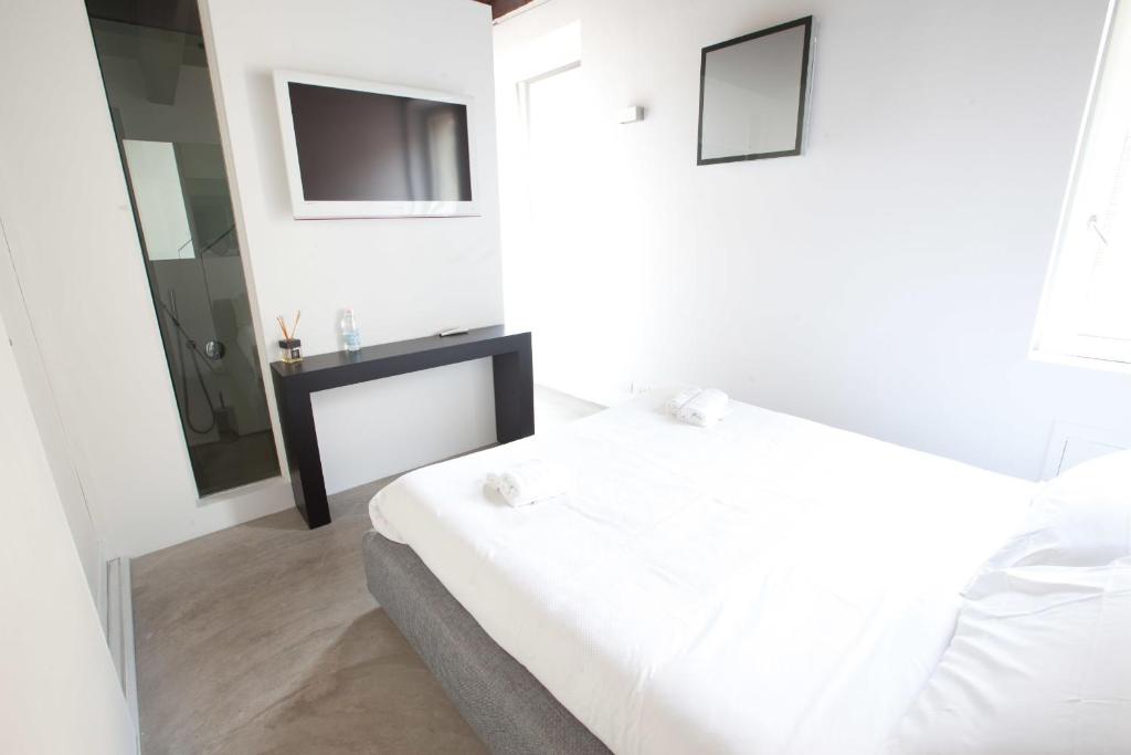 Postel nebo postele na pokoji v ubytování Casa Valentina