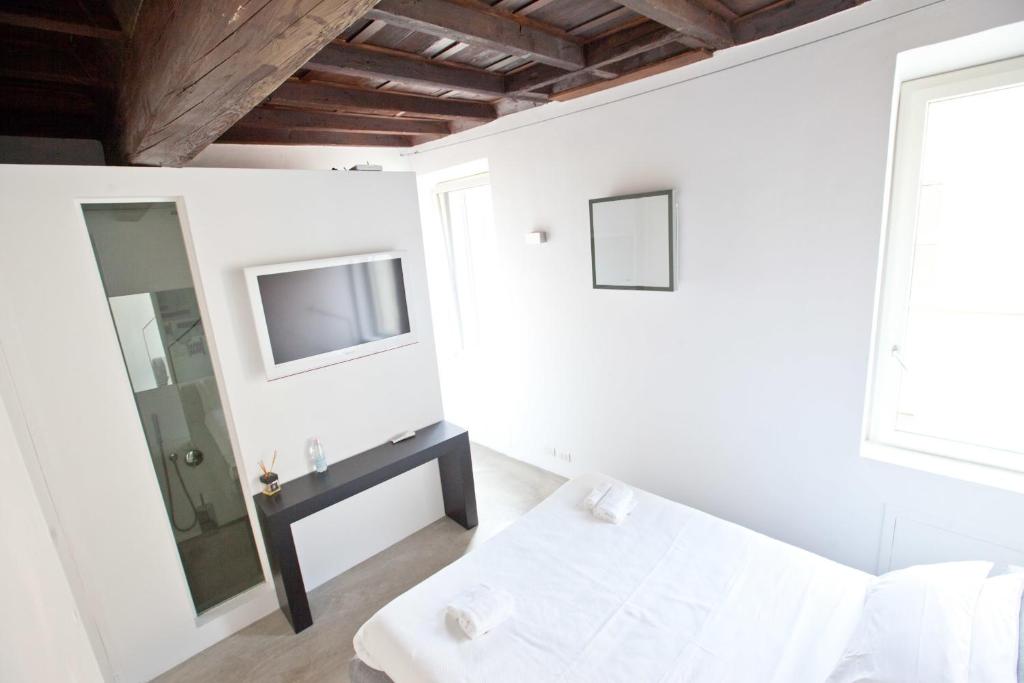 Postel nebo postele na pokoji v ubytování Casa Valentina