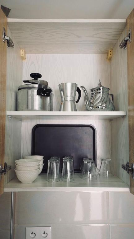 Kuchyň nebo kuchyňský kout v ubytování Appartement AL-RIMAL POUR LES FAMILLES
