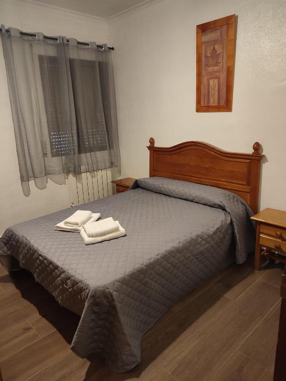 Postel nebo postele na pokoji v ubytování El Cruce Hornos