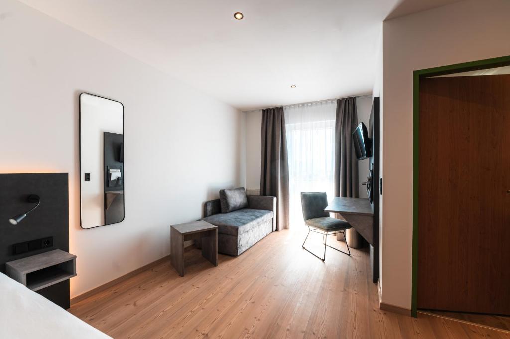 Postel nebo postele na pokoji v ubytování Landhotel Prielbauer