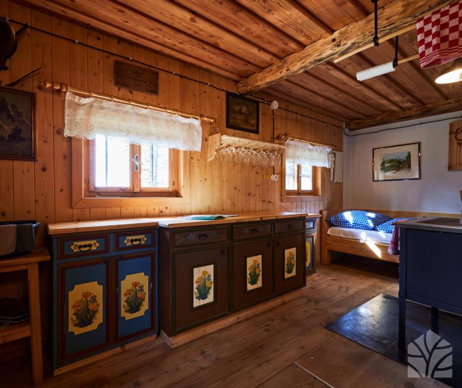 Postel nebo postele na pokoji v ubytování Waldhütte KOSAK - jetzt neu mit Bad & WC