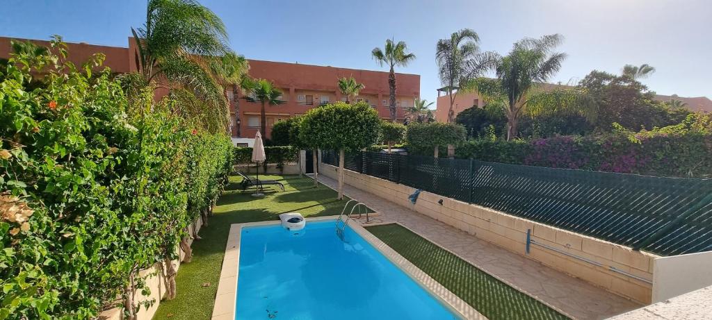 Bazén v ubytování Homes of Spain, Apartamentos Paraíso Vera Playa, Ed Nuku Hiva, Bajo X con PISCINA PRIVADA y jardín privado a PIE de PLAYA , WIFI nebo v jeho okolí