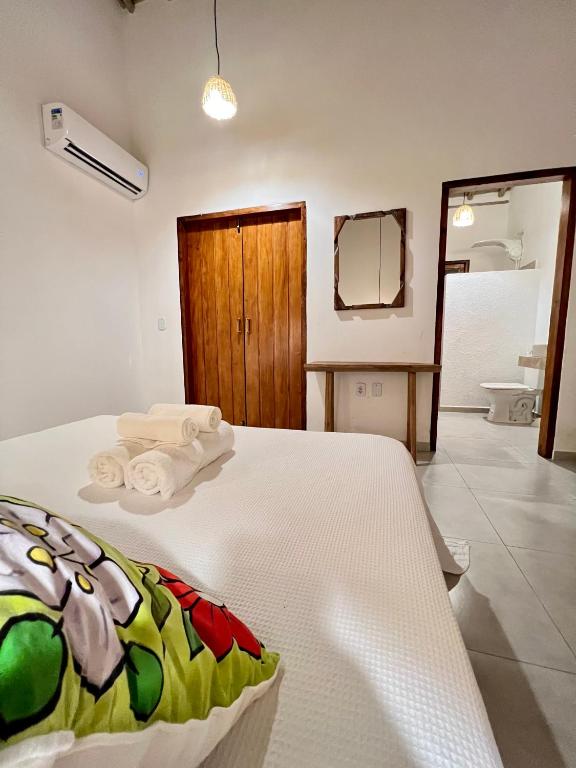 Postel nebo postele na pokoji v ubytování Villa Sagui Trancoso