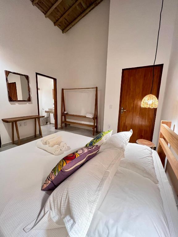 Postel nebo postele na pokoji v ubytování Villa Sagui Trancoso