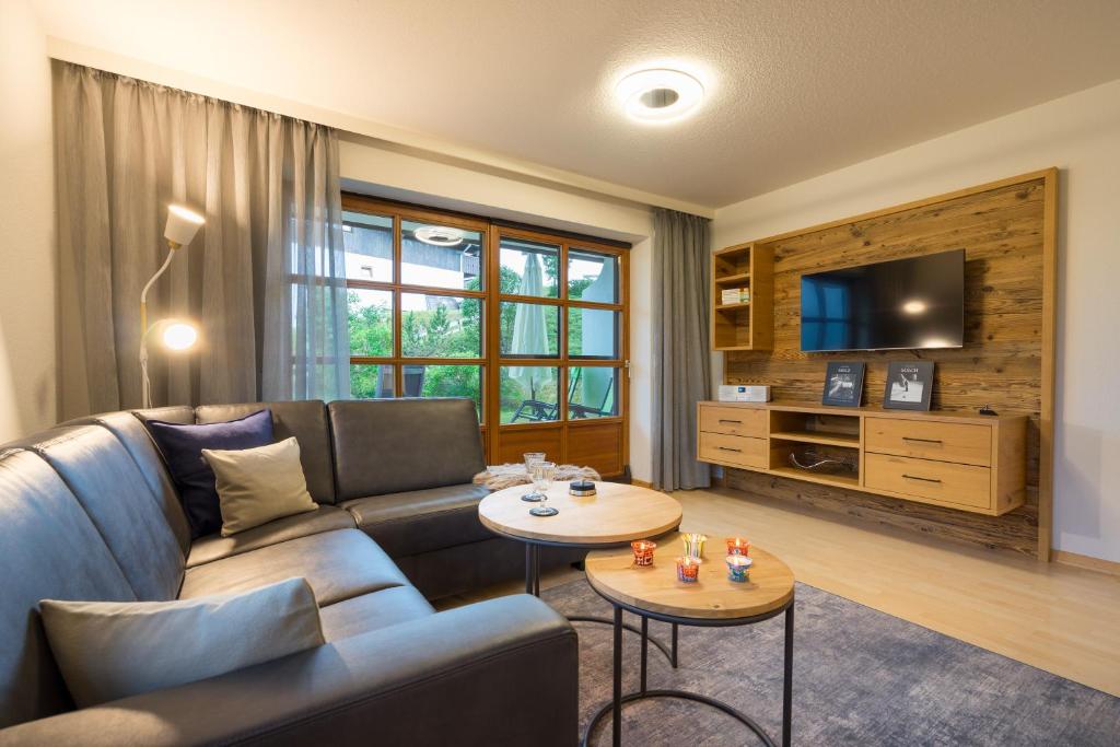 TV/trung tâm giải trí tại Ferienwohnung Alpentraum-Panorama Chalet