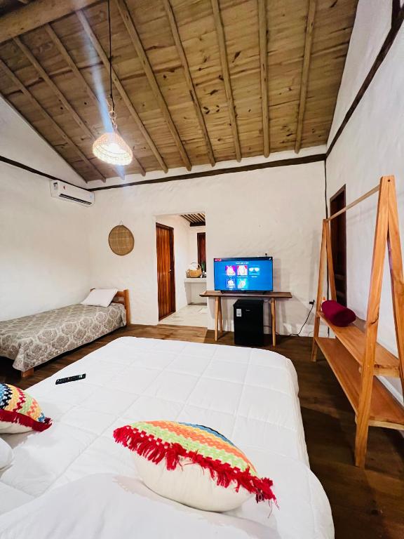 Postel nebo postele na pokoji v ubytování Villa Sagui Trancoso