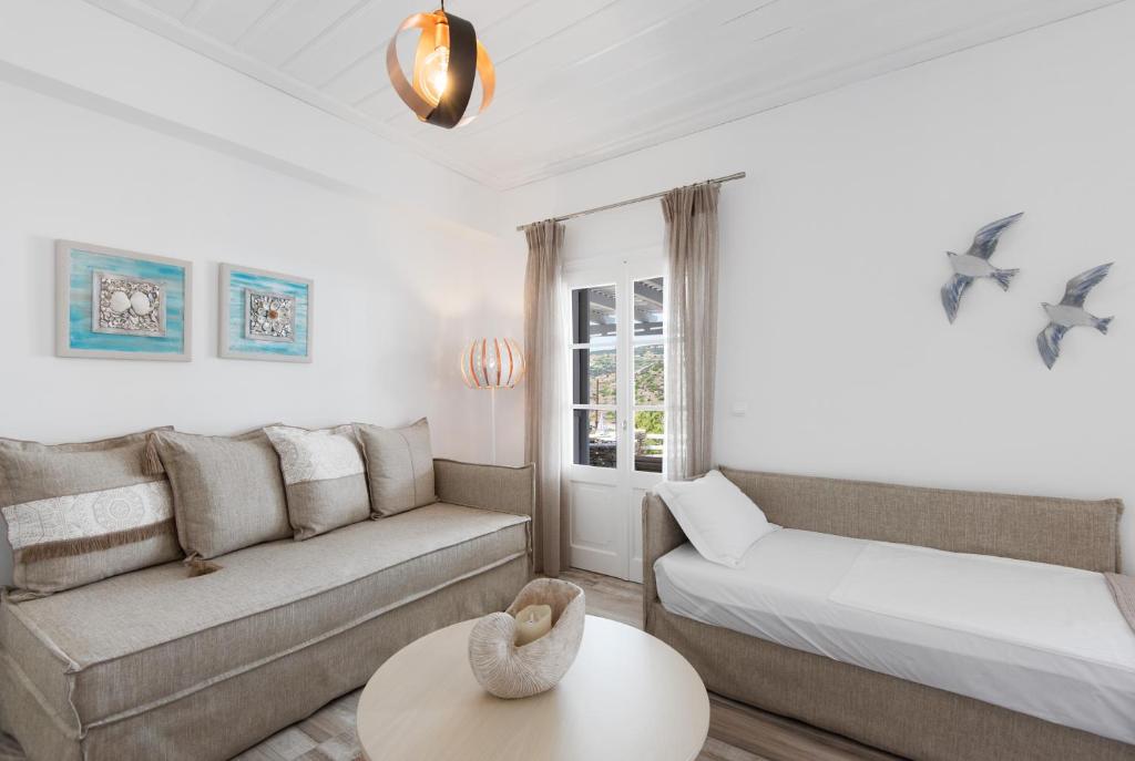 A bed or beds in a room at Erifili Houses
