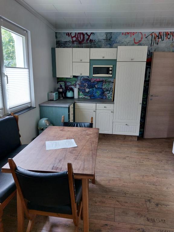 Kuchyň nebo kuchyňský kout v ubytování Schöne Wohnung direkt am Bach