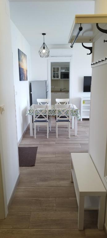 Televízia a/alebo spoločenská miestnosť v ubytovaní Apartments Villa Elma