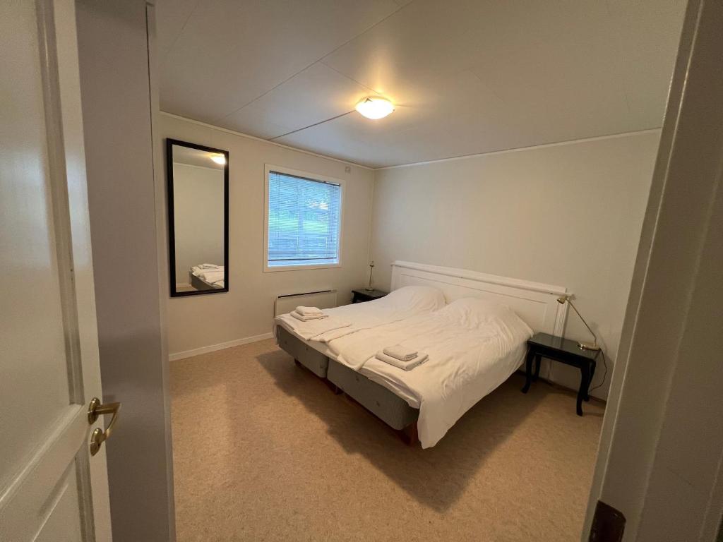 Postel nebo postele na pokoji v ubytování Geiranger booking 17