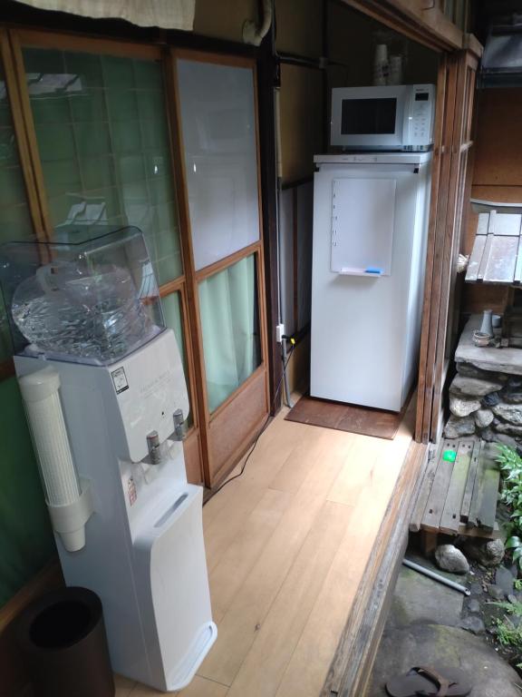 Kuchyň nebo kuchyňský kout v ubytování Wajimaya Ryokan