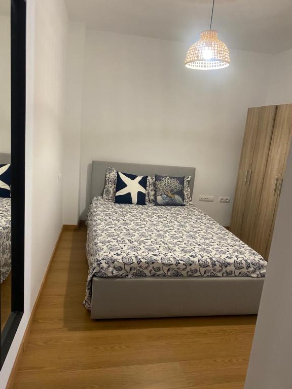 Ένα ή περισσότερα κρεβάτια σε δωμάτιο στο Apartamento Punta Umbría junto a la Ría